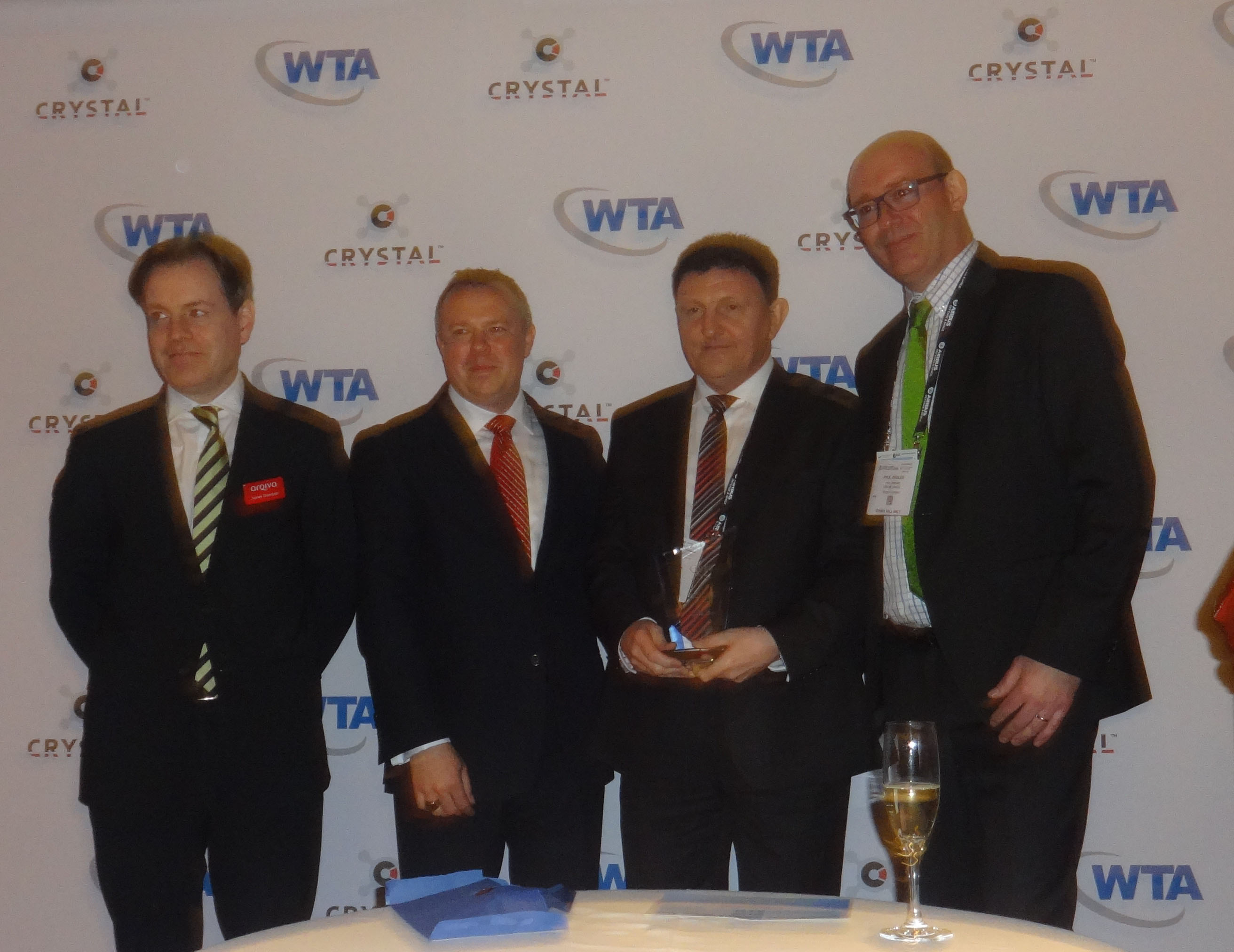 STN General Manager Anver Anderson (second from right) accepting the Independent Teleport of the Year award.
